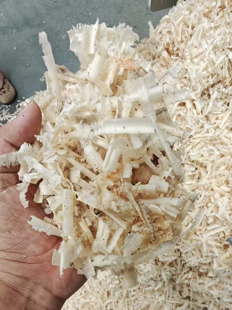 Finished curled wood flakes for panel and biomass processing